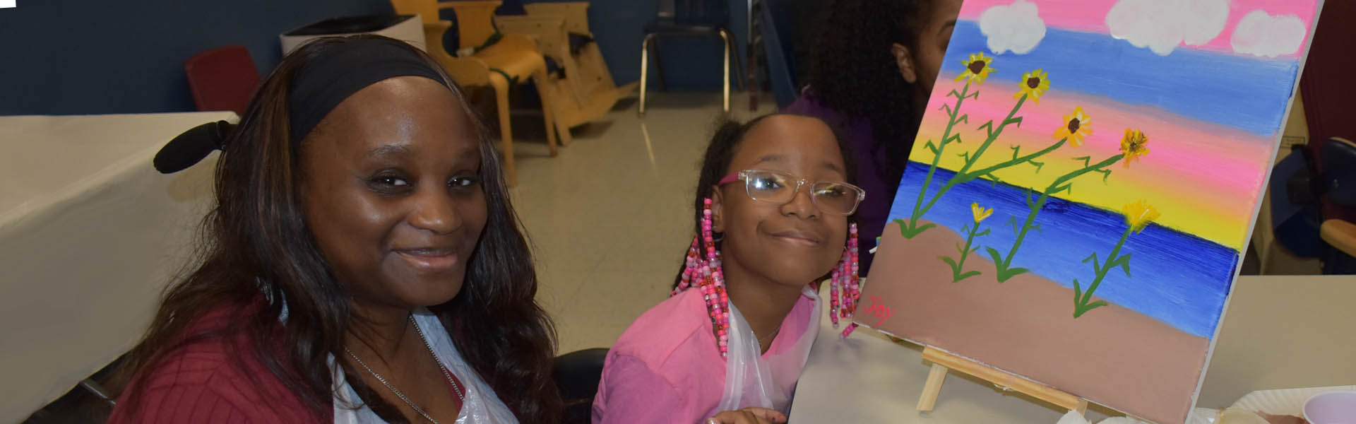 NJEDDA Elementary student with her mother at a family event held at the school.