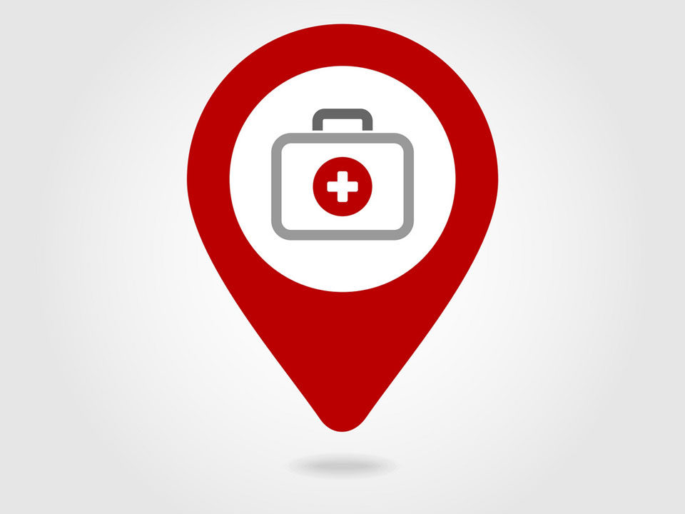 image of red map pin with first aid kid