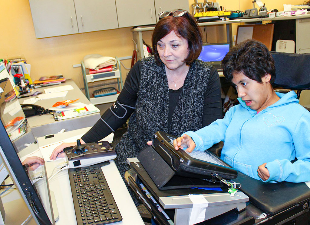 NJEDDA student and teacher work with new AT devices made possible by support from The Community Foundation of New Jersey