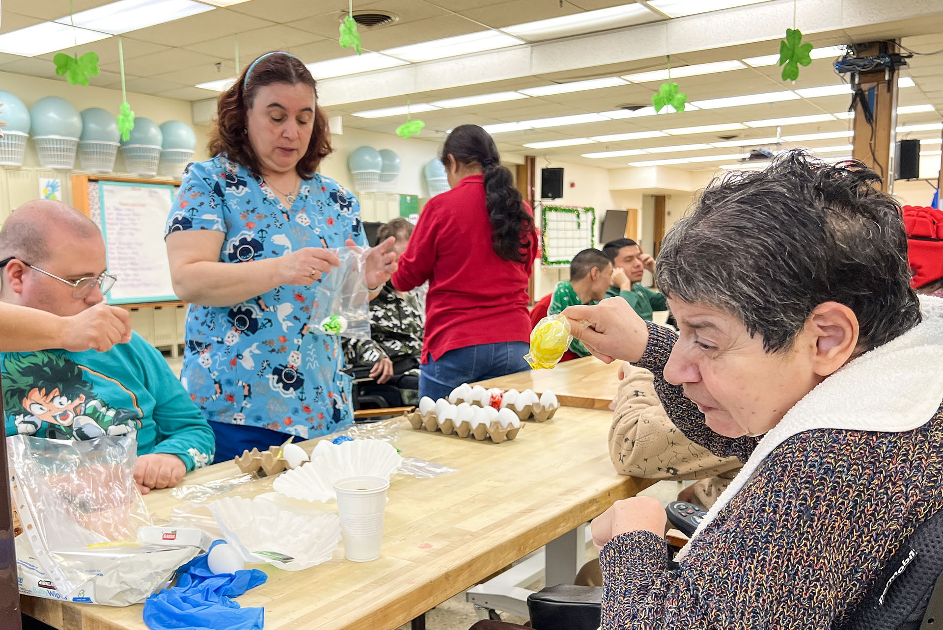 NJEDDA Adult Training Center participants working on Easter Egg dying activity